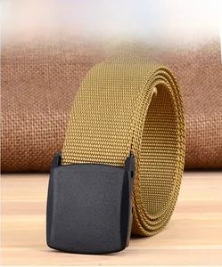 Close-up of thick khaki tactical nylon belt showing dense weaving and black YKK plastic buckle