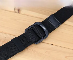 Close-up of matte black double ring buckle and elastic nylon woven tactical belt texture