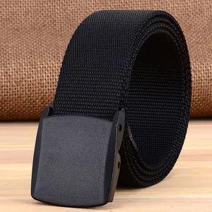 Close-up of black nylon tactical belt with matte YKK plastic buckle and mesh texture
