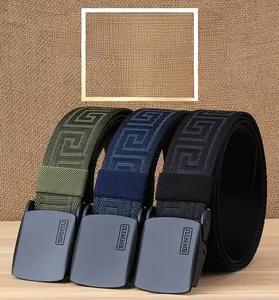 Three nylon canvas belts with Greek key patterns and black matte alloy buckles on wood