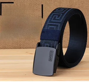 Detail of durable navy nylon belt with geometric pattern and black matte buckle