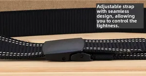 Detail of YKK plastic buckle and thick nylon belt with white stitching on edges