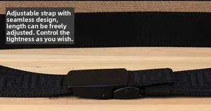 Close-up of the hole-free canvas belt featuring a Greek fret pattern and matte auto-buckle