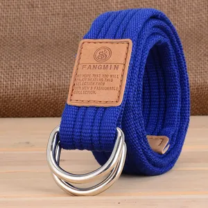 Ceinture homme en toile bleu marine avec boucle double anneau D et embout en cuir