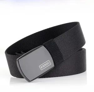 Close-up of tactical nylon belt with matte metal buckle and engraved logo detail