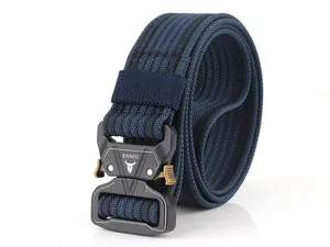 Detail of a tactical nylon belt featuring a quick-release metal cobra buckle and woven strap