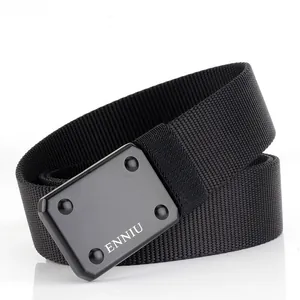 Macro detail of black nylon tactical belt featuring matte metal buckle with brand logo