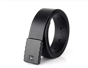 Close-up of tactical leather belt with matte black buckle and detailed cow head logo