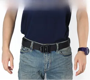 Close-up of tactical nylon belt featuring an ENNIU quick-release metal buckle and webbed texture
