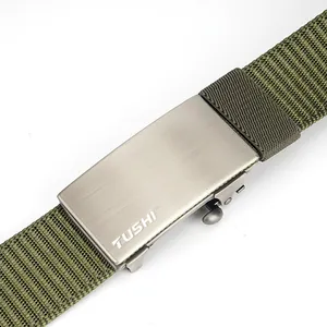 Detail of army green nylon belt with matte silver automatic buckle and brushed finish
