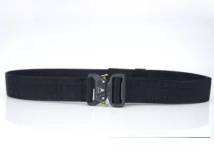 Close-up of black tactical nylon belt with metal quick-release buckle and woven texture