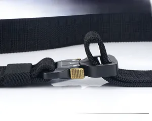 Detail of black nylon tactical belt featuring a quick-release zinc alloy buckle closure