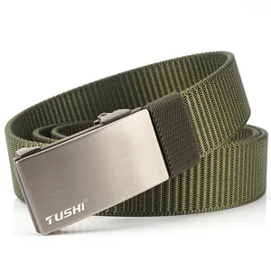 Detail of army green nylon belt with brushed grey metal automatic buckle and textured band