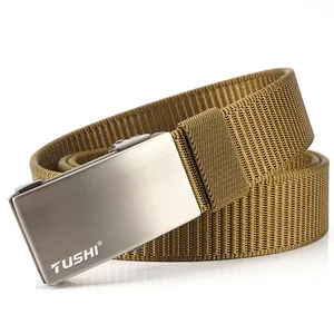 Detailed macro view of brown woven nylon tactical belt with matte metal buckle