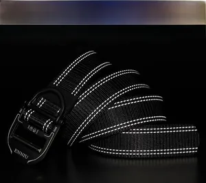Close-up of tactical nylon belt with dual reflective stripes and matte alloy buckle