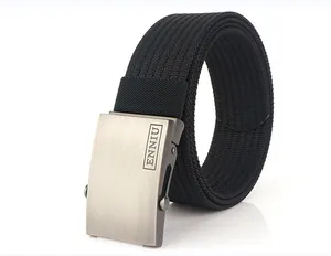Close-up of black nylon woven belt with square alloy buckle and brushed metal finish