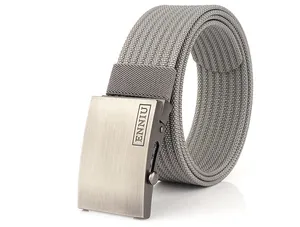 Detail of grey nylon web belt featuring a matte brushed metal buckle and woven texture