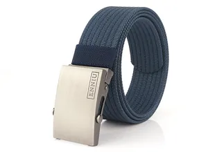 Detail of navy blue nylon belt with silver-grey brushed metal smooth buckle for outdoor use