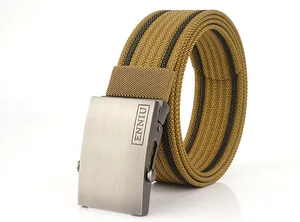 Detailed macro view of khaki nylon web belt with black stripes and gray metal buckle