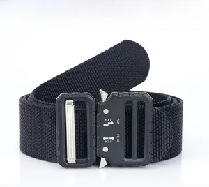 Close-up of black nylon tactical belt buckle with quick release mechanism and load parameters