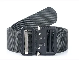 Detailed macro view of dark grey tactical nylon belt with metal quick release buckle