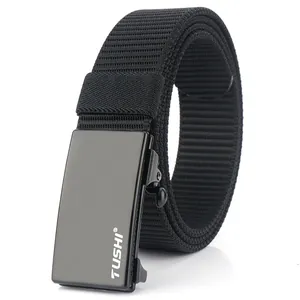 Close-up of black nylon belt with premium metal buckle and textured woven strap