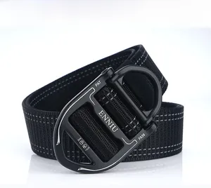 Detail of matte black alloy tactical buckle with laser-etched specifications on nylon belt
