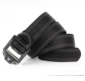 Macro shot of durable black nylon tactical belt with metal quick-release buckle and D-ring