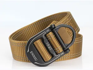 Detail of tan tactical nylon belt featuring a black alloy quick-release D-ring buckle