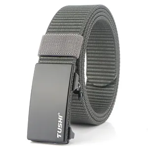 Detailed view of the dark grey nylon woven strap with a black metal automatic buckle