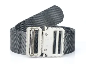 Macro shot of durable nylon tactical belt featuring silver metal quick-release cobra buckle