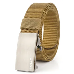 Detail of khaki tactical nylon belt with brushed silver metal automatic buckle and logo