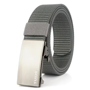 Detailed macro shot of grey nylon belt with a brushed metal automatic buckle and logo