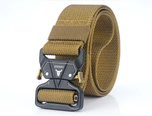 Close-up of coyote tan nylon tactical belt with matte black quick-release metal buckle