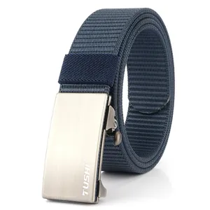 Detail of navy blue nylon woven belt with brushed metal automatic buckle and logo