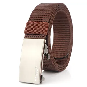 Detail of men's nylon belt with brushed metal automatic buckle and woven texture