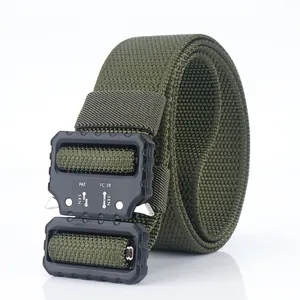Detail of army green tactical nylon belt with black metal quick-release cobra buckle