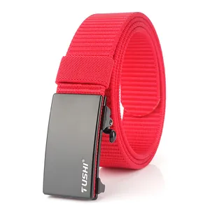 Detail of red nylon woven belt with a sleek matte black automatic metal buckle