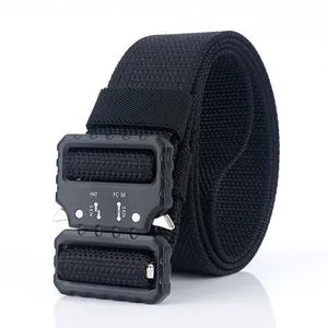 Detailed close-up of matte black metal quick-release buckle on a nylon tactical belt
