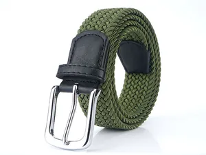 Detail view of military green elastic woven belt with silver buckle and black leather accents