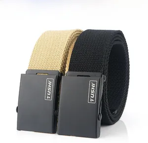 Close-up of nylon woven belts in khaki and black with metallic TUSHI buckle