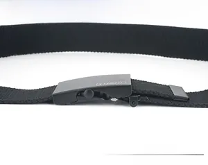 Detail of matte black tactical buckle with adjustable black woven canvas belt strap