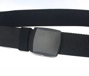 Detail of black nylon woven belt featuring a quick-release matte plastic buckle mechanism