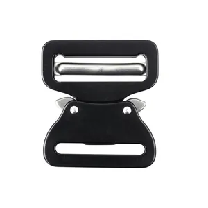 Detailed macro view of black matte tactical quick release buckle with silver slide bar