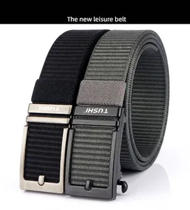 Macro shot of black and army green nylon belts with brushed metal and matte buckles
