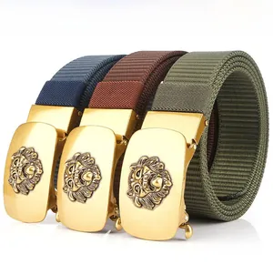 Three nylon belts in blue, brown, and green with golden lion head buckles