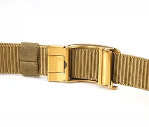 Detail of khaki nylon tactical belt showing the gold zinc alloy automatic buckle closure