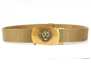Close-up of golden lion head buckle on khaki tactical nylon belt with quick release detail
