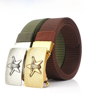 Detail of army green and brown woven nylon belts with embossed metal star and bull buckles