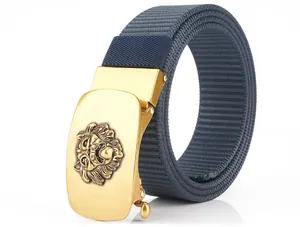 Close-up of golden lion head buckle on a durable navy blue nylon woven canvas belt